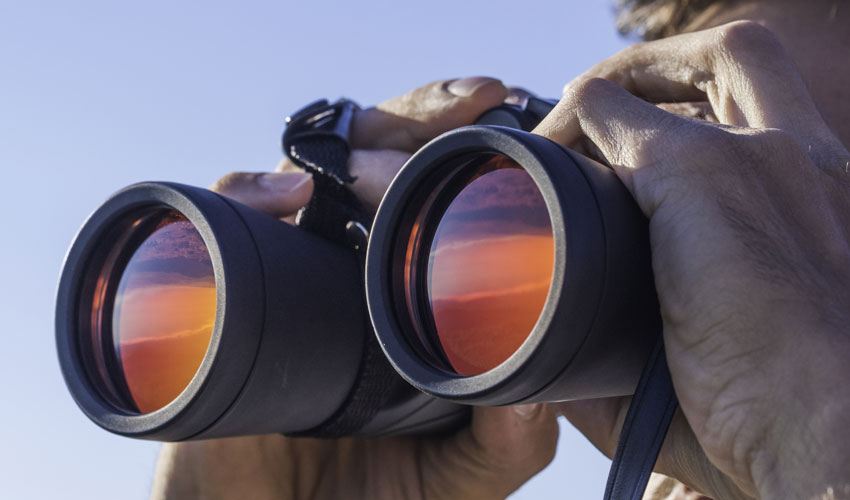 Man using binoculars