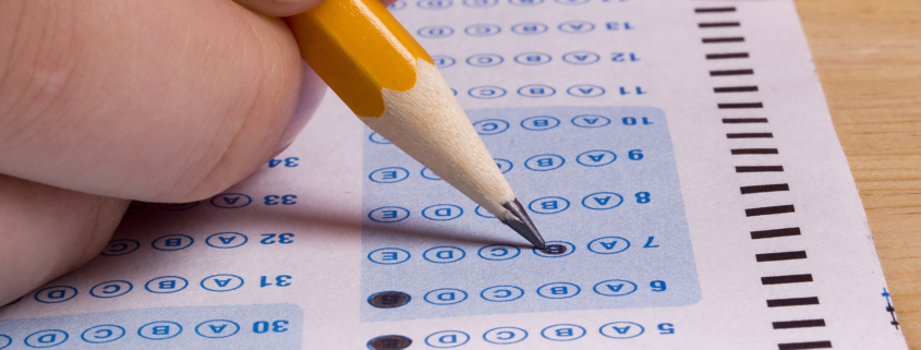 User filling out scantron test